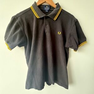 Fred Perry Polo Shirt in Black with Yellow Trim